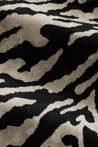 Close-up of the fabric of The Lola 4 Seater Sofa in Tiger Print Velvet.
