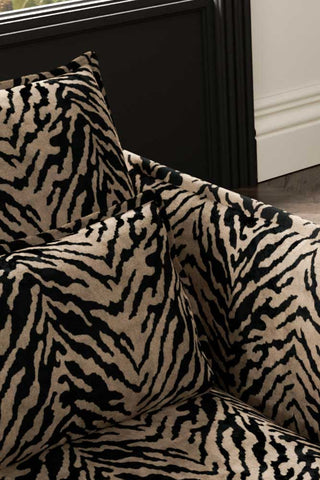 Close-up of the back/cushion of The Lola Snuggle Seat in Tiger Print Velvet.