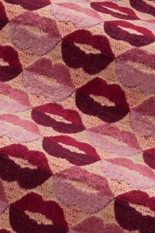 Close-up of the fabric of The Lola 2 Seater Sofa in Woven Red & Pink Lips Velvet.