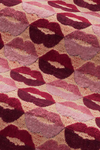 Close-up of the fabric of The Lola 3 Seater Sofa in Woven Red & Pink Lips Velvet.