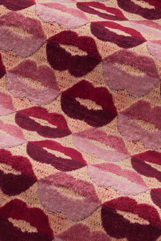 Close-up of the fabric of The Lola 4 Seater Sofa in Woven Red & Pink Lips Velvet.