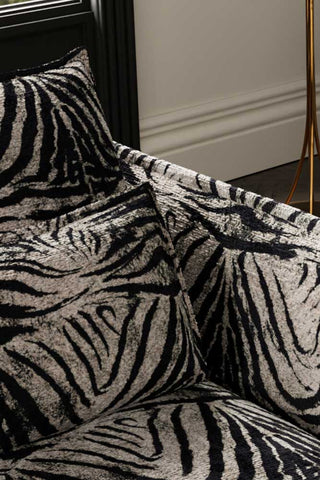 Close-up of the cushions/back of The Lola 3 Seater Sofa in Zebra Print Velvet.