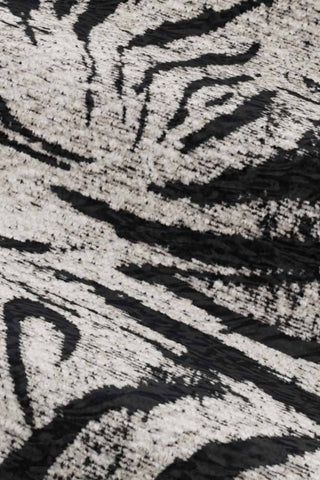 Close-up of the fabric of The Lola Snuggle Seat in Zebra Print Velvet.