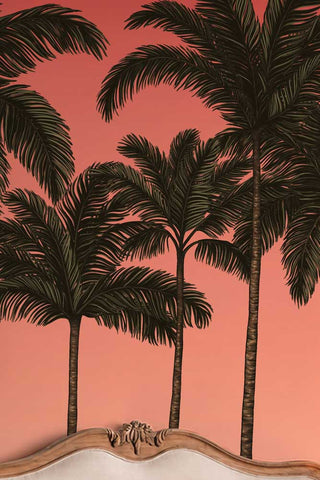 Detail of the palm trees in The Palm Paradiso Mural Wallpaper in Coral. 