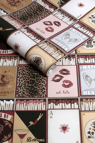 The roll of The Perfect Match Wallpaper in Peach.