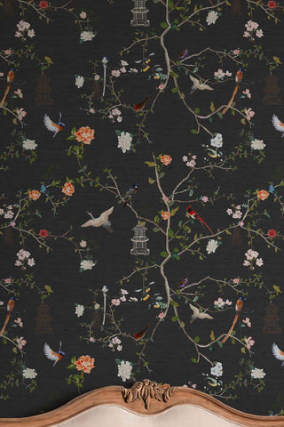Close up of The Secret Garden Chinoiserie Wallpaper in Black Ink in a bedroom.