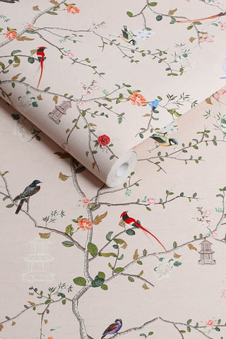 The roll of The Secret Garden Chinoiserie Wallpaper in Ivory.