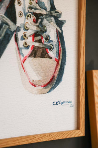 Close-up image of the The Sneakers Framed Art Print