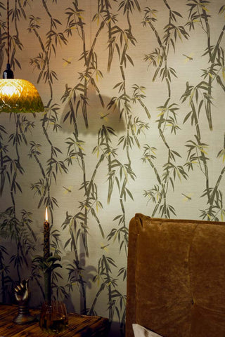 Close up of The Wham Bamboo Wallpaper in Sage Green in a bedroom setting. 