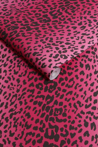 The roll of The Wild At Heart Wallpaper in Pink.