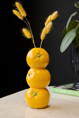 Lifestyle image of the Trio Of Oranges Vase