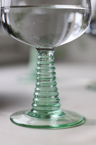 Close-up image of the 70s French Style Wine Glass In Green