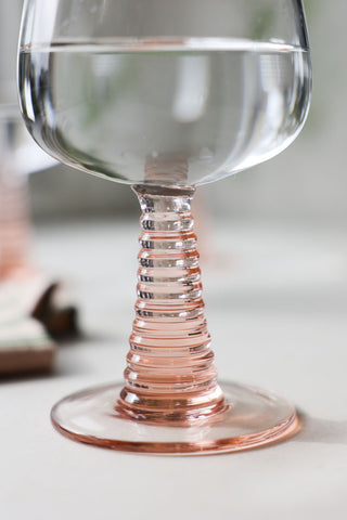 Close-up image of the 70s French Style Wine Glass In Pink