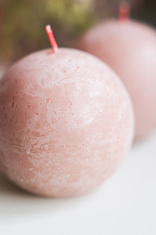 Close-up image of the Unique Ball Candle In Misty Pink