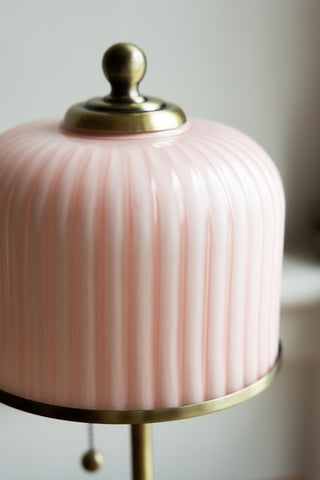 A close up image of the fluted glass detailing on the Vintage Pink Fluted Glass Table Lamp.