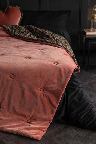 Close-up image of the Vintage Pink Reversible Velvet Throw