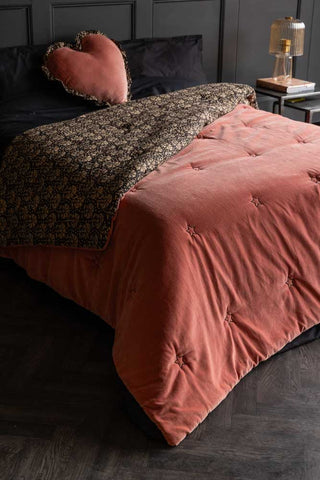 Lifestyle image of the Vintage Pink Reversible Velvet Throw