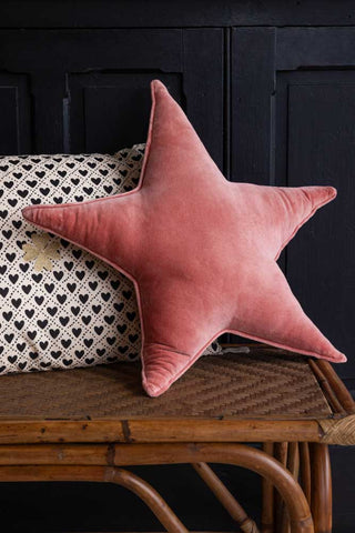 Lifestyle image of the Vintage Pink Star Velvet Cushion