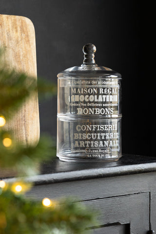 Image of the Vintage-Style Glass Storage Jar with Lid on a cabinet