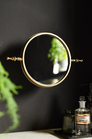 Lifestyle image of the Vintage-Style Gold Vanity Wall Mirror