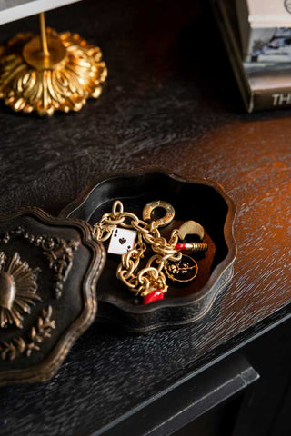 The Vintage-Style Milagro Heart Trinket Box shown open with jewellery inside.