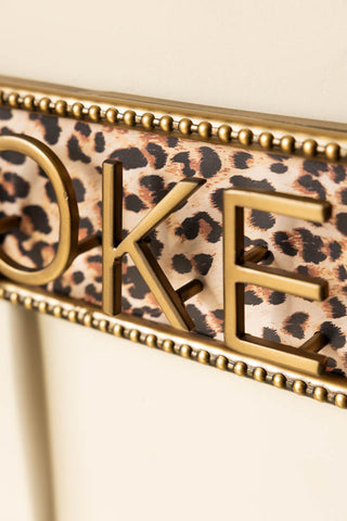 Image of the finish on the Vintaged-Style Leopard Print Wall Hooks