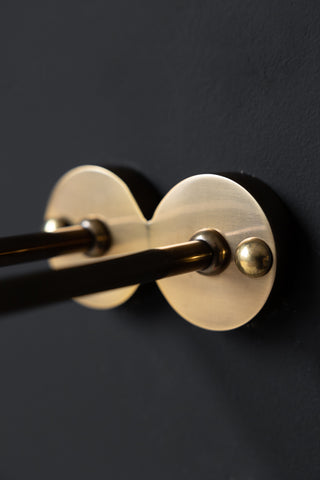 Close-up image of the Wall Mounted Brass Wine Glass Holder