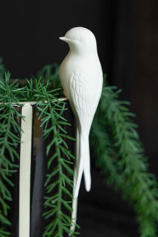 Lifestyle image of the White Swallow Bird Ornament