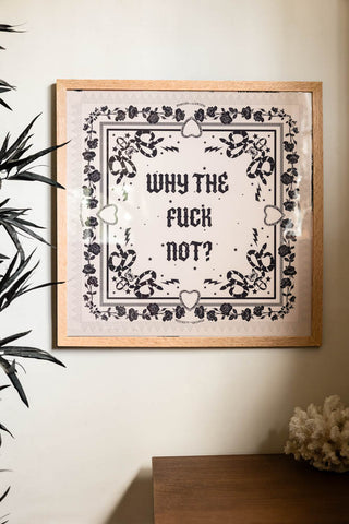 Lifestyle image of the Why The Fuck Not 50cm x 50cm Art Print in a natural frame on a light background