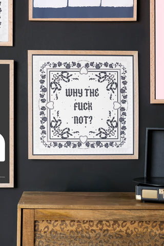 Lifestyle image of the Why The Fuck Not 50cm x 50cm Art Print in a natural frame on a dark background