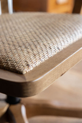 Close-up image of the Wicker Swivel Desk Chair