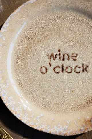 Close-up image of the Wine O'Clock Ceramic Side Plate