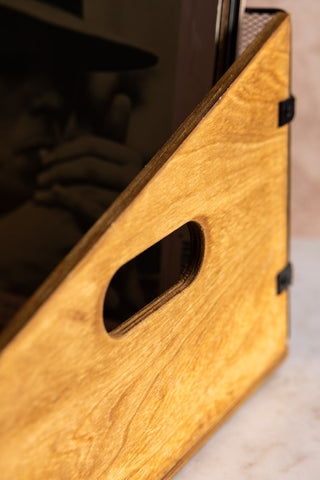 The side handle on the Wood & Mesh Record Storage Box. 