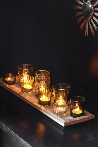 Image of the Wooden Tray With Green Glass Candle Holder Votives with the candles lit