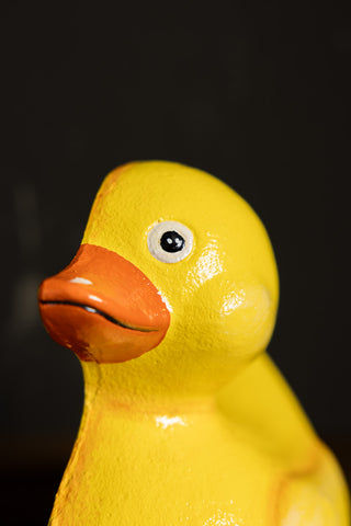 Close-up of the face of the Yellow Duck Cast Iron Doorstop.