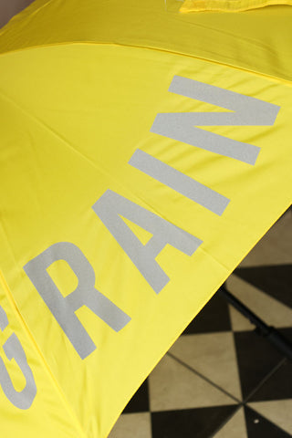 Close-up image of the Yellow Reflective Fucking Rain Umbrella