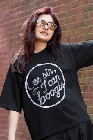 Lifestyle image of the Yes, Sir, I Can Boogie T-Shirt in Black - Available in 6 Sizes