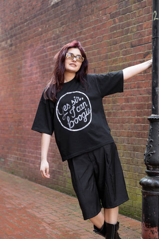 Image of a model wearing the Yes, Sir, I Can Boogie T-Shirt in Black - Available in 6 Sizes