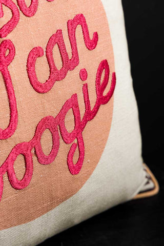 Close up of the bright pink embroidery on the front of the Yes Sir, I Can Boogie Embroidered Cushion