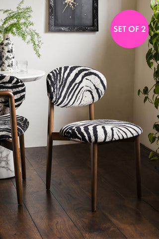 Lifestyle image of the Set of 2 Zebra Print Velvet Dining Chairs