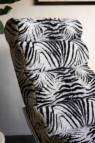 The back and headrest of the Zebra Print Lounger Chair. 