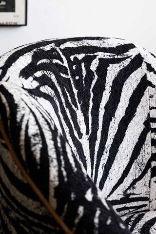Detail of the backrest of the Zebra Print Tassel Swivel Chair.