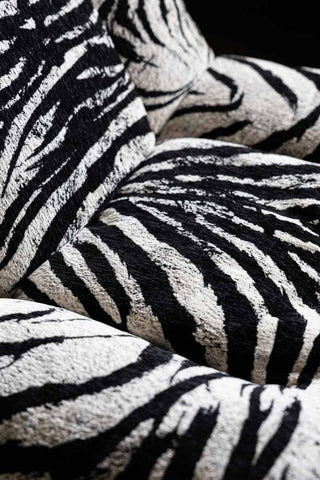 Close-up of the seat of the Zebra Print Velvet Swivel Chair.