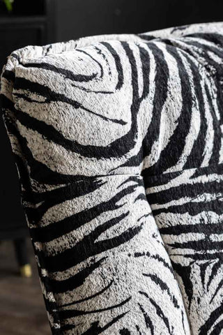 Close-up of the back of the Zebra Print Velvet Swivel Chair.