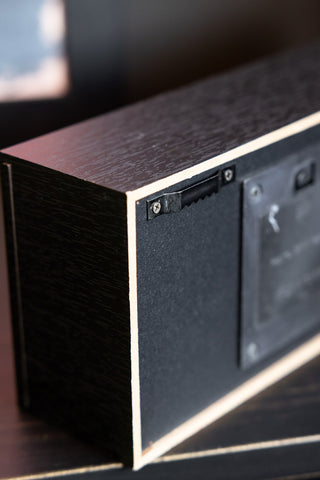 Image of the hanging hooks on the back of the Zero Fucks Light Box