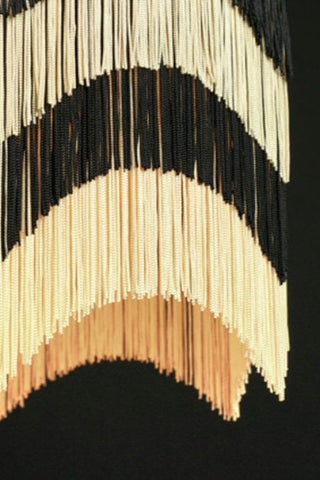 Close up of Anna Hayman fringe ceiling lampshade. 