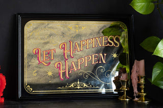 Beautiful vintage style mirror with 'let happiness happen' written in stylistic font across the centre.