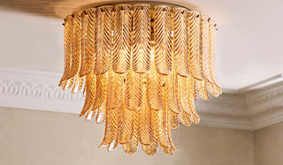 Lifestyle image of the Feather Ceiling Light illuminated.