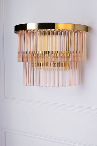 Lifestyle image of the Pink Tiered Glass Wall Light