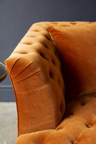 Detail image of the arm on the Burnt Orange Velvet Chesterfield Sofa